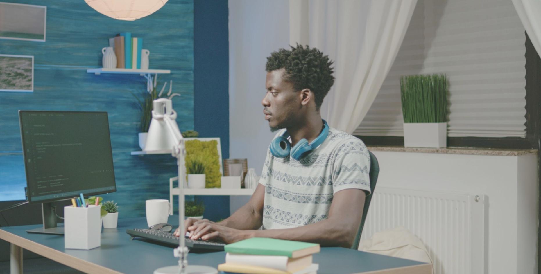 Team collaboration session with UI design prototypes displayed on large screen